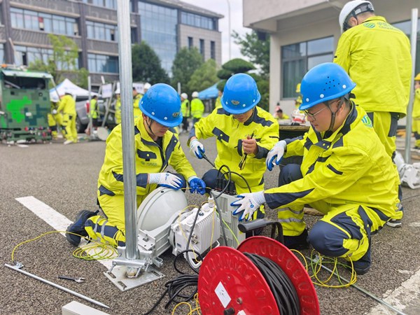 2025年“鑄劍﹒網絡應急先鋒”應急通信保障實操比武現場。重慶移動供圖